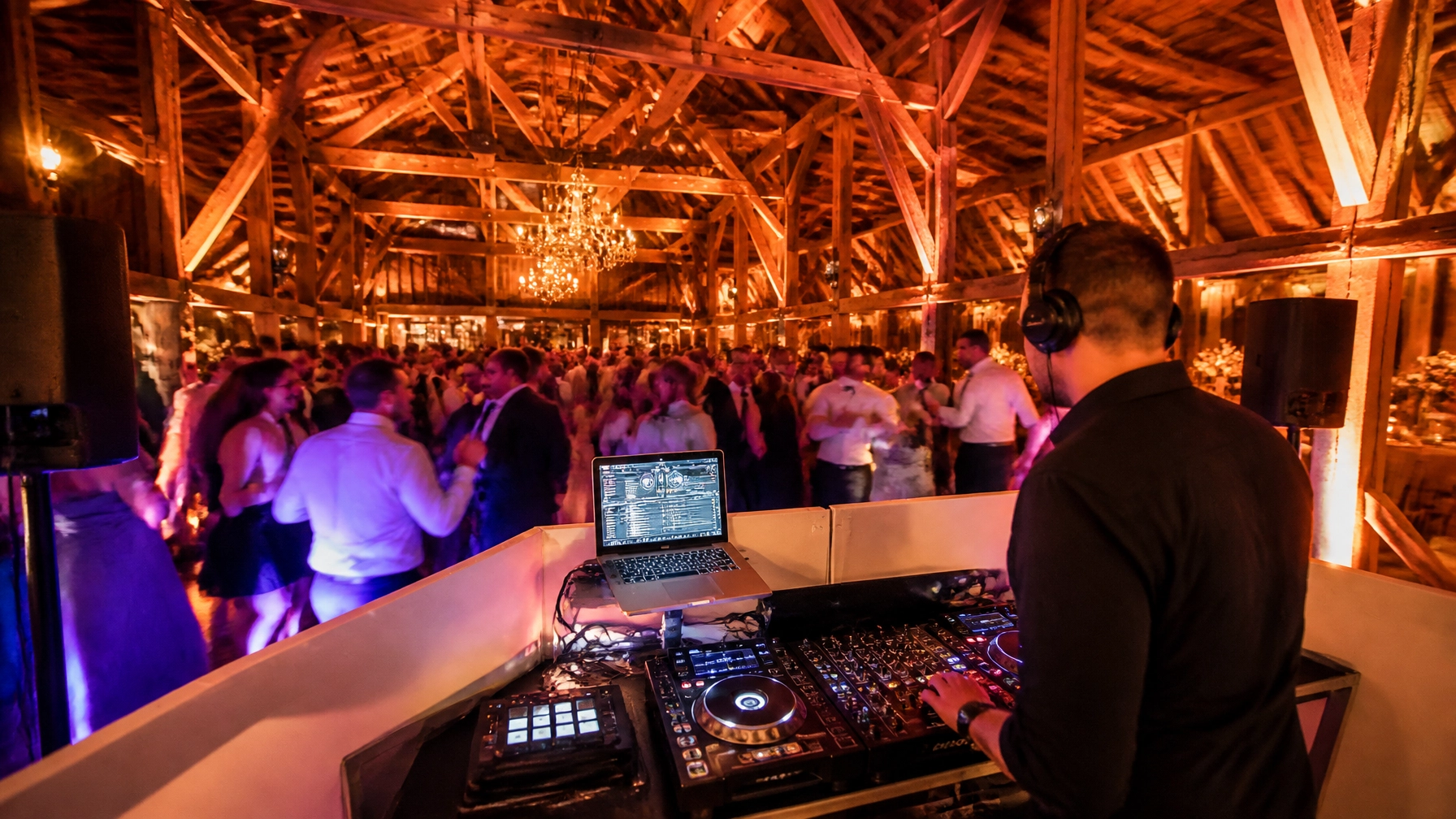 Why a Live DJ Beats a Playlist Every Time (Especially in Mid-Michigan)